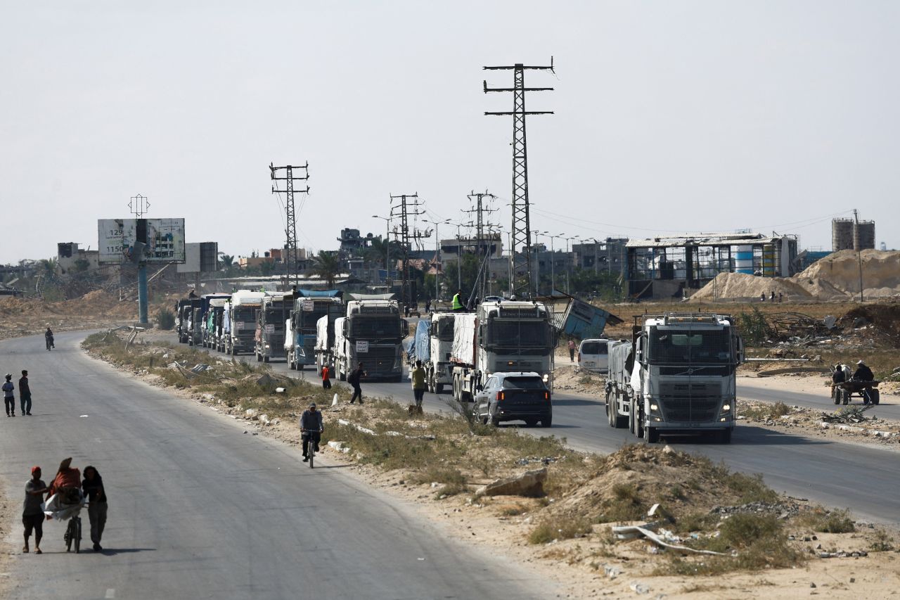 Trucks carry aid in Khan Younis, in the southern Gaza Strip.