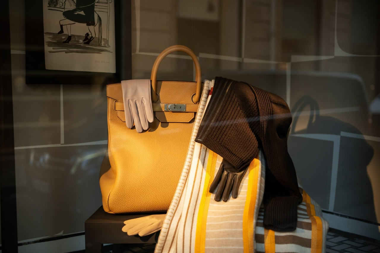 Iconic Hermès silk scarves and Birkin handbags.