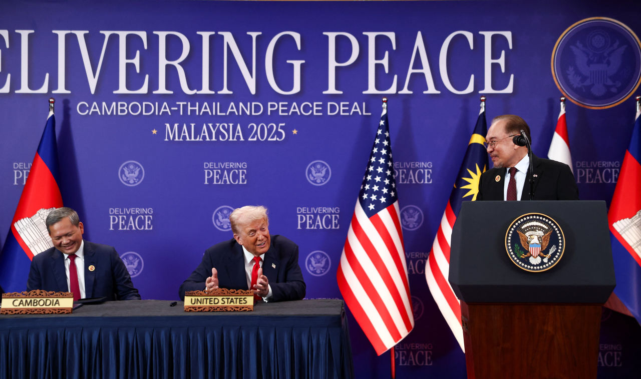President Trump at a signing ceremony for an agreement to end border clashes between Cambodia and Thailand. President Trump at a signing ceremony for an agreement to end border clashes between Cambodia and Thailand.