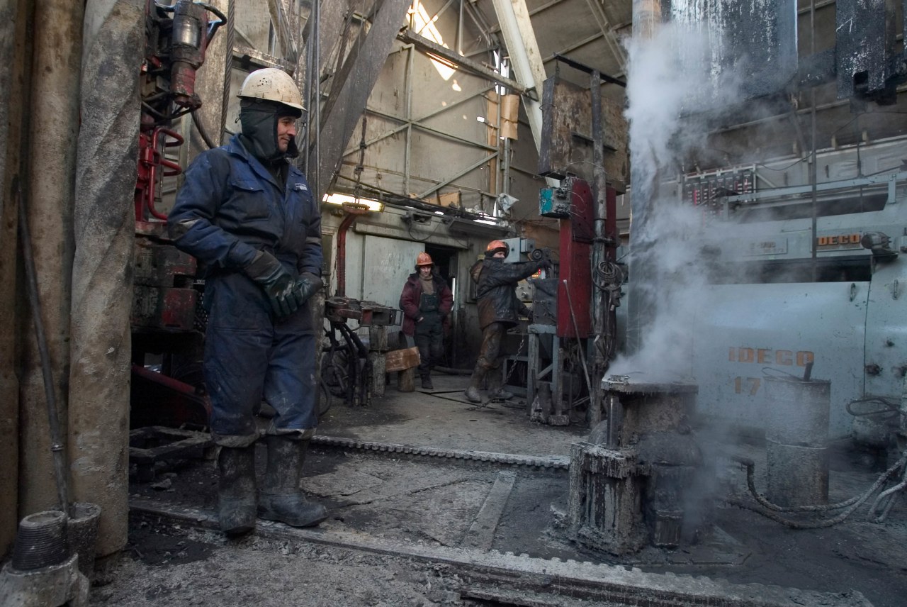 Workers at an oil rig in Siberia in 2004.