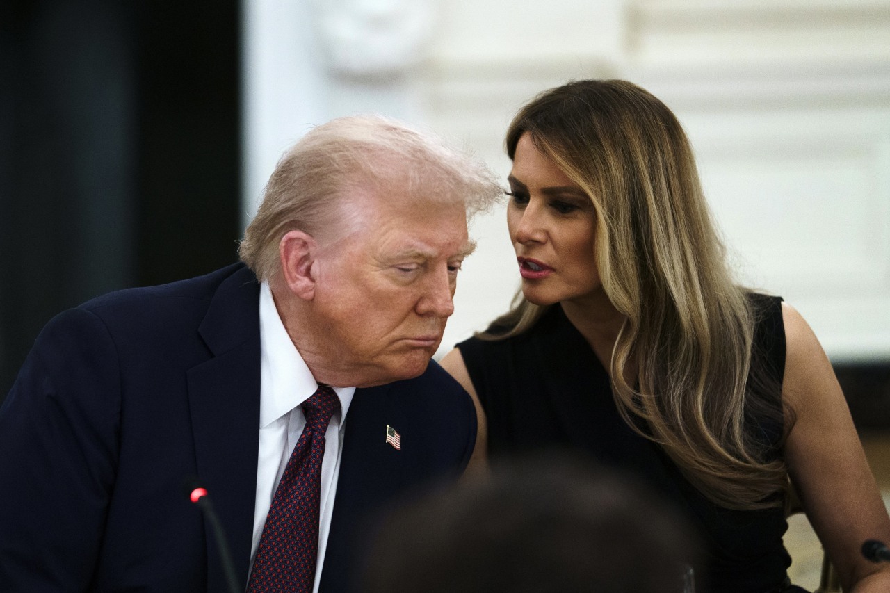 First lady Melania Trump with the president during a White House dinner in September.