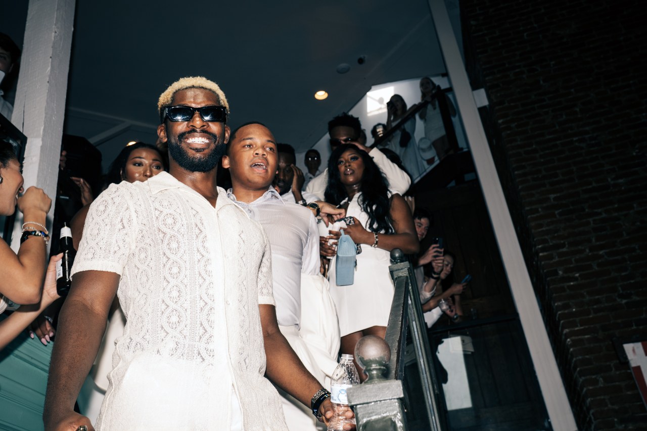 CJ Pearson, center without glasses, and other conservative influencers at a party in Washington in July.