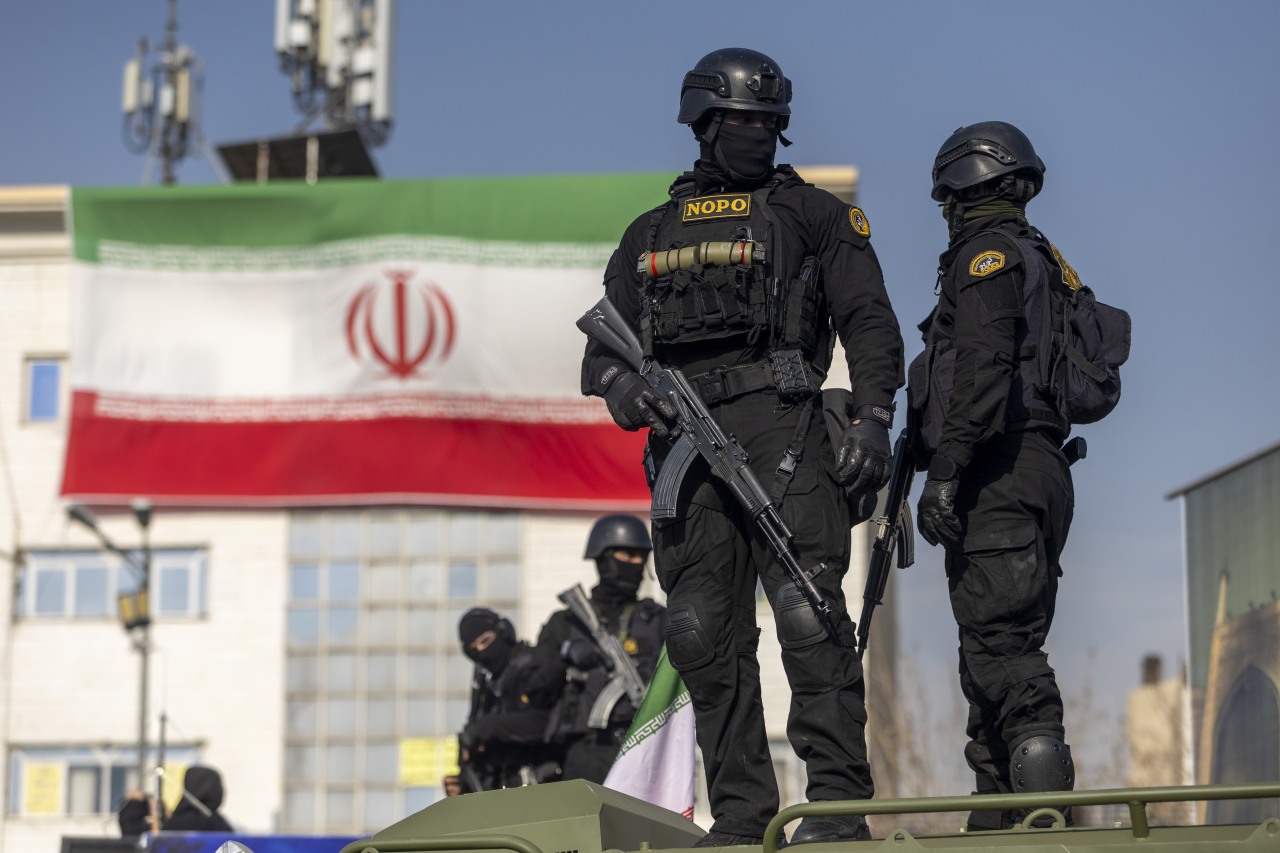 Security forces at a pro-government rally in Tehran on Monday.