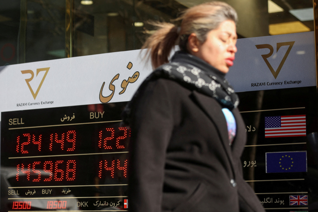 A person walked past a currency exchange as the rial plummeted late last month.