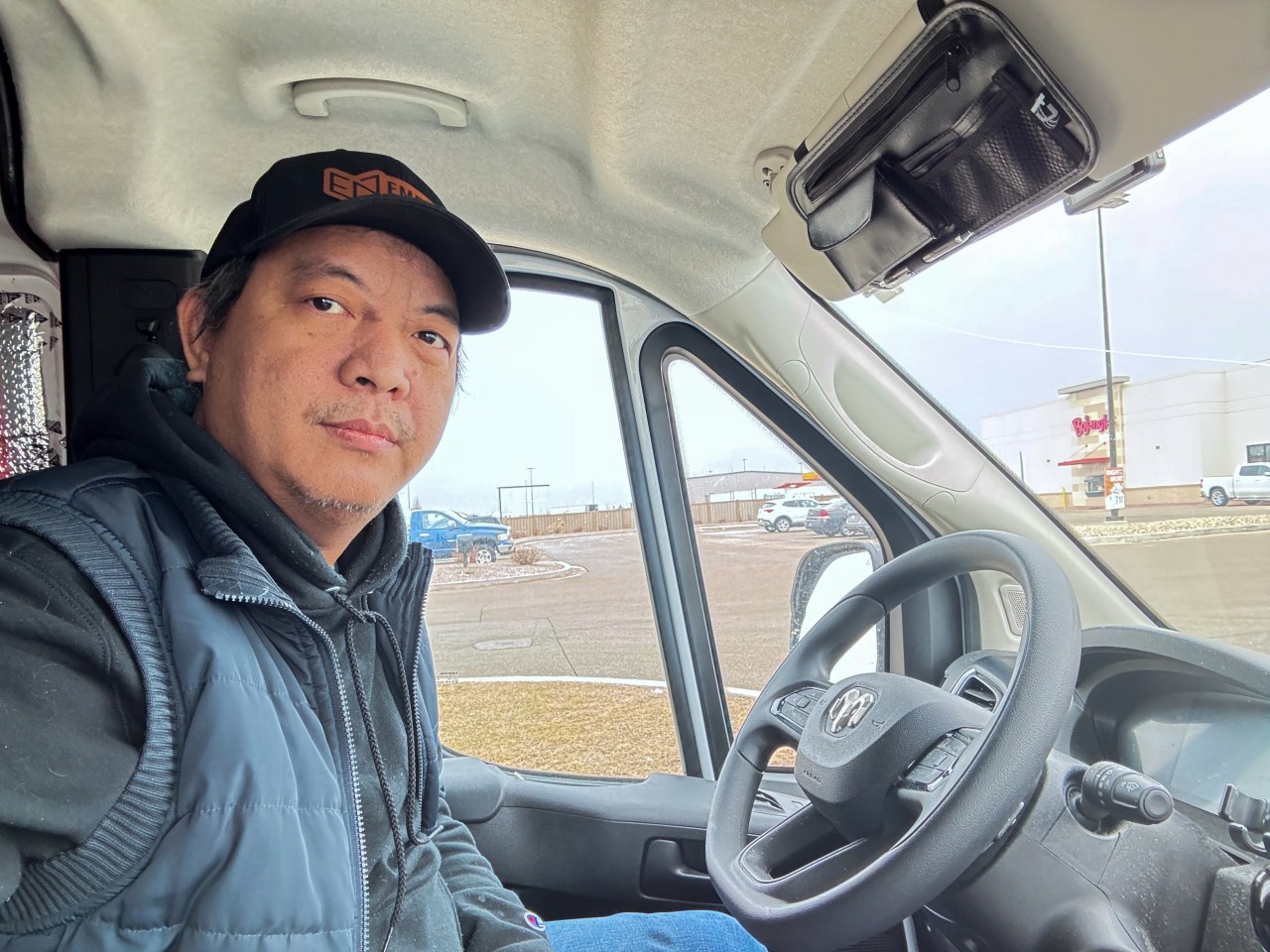 Aung Min Tun, a delivery-van driver in Illinois.