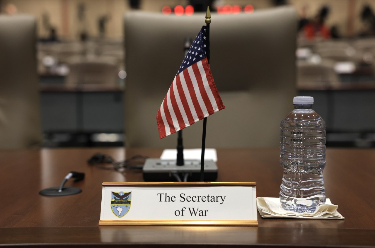 A placard marks the seat for Defense Secretary Pete Hegseth before the start of the inaugural Americas Counter Cartel Conference in Doral, Fla., this week.