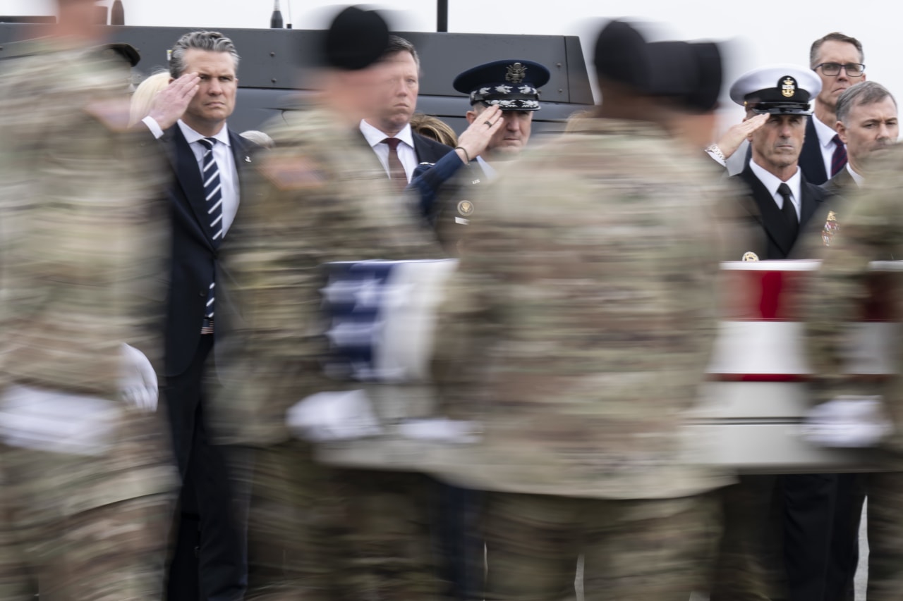 Defense Secretary Pete Hegseth and Gen. Dan Caine, chairman of the Joint Chiefs of Staff, at Dover Air Force Base in Delaware last week.