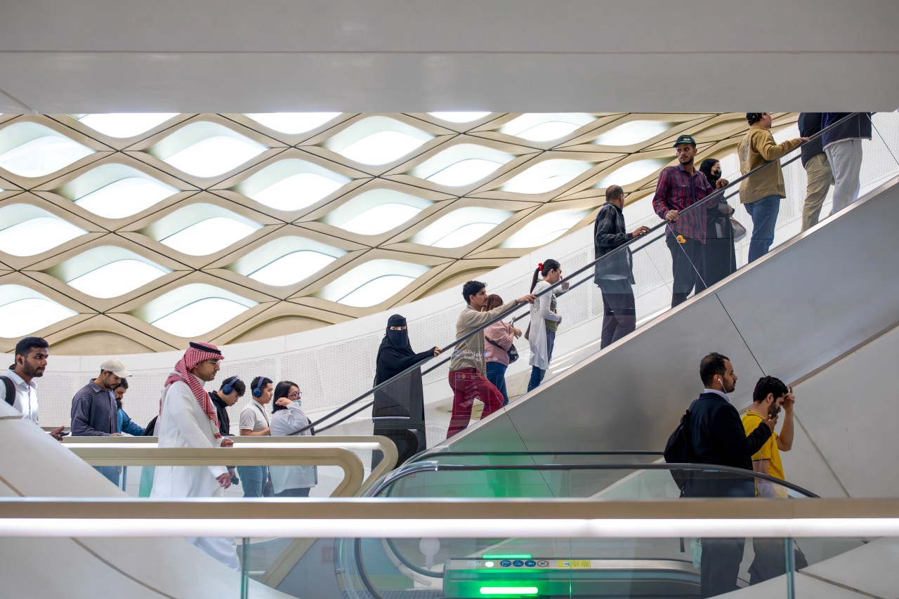 Commuters inside the metro station.